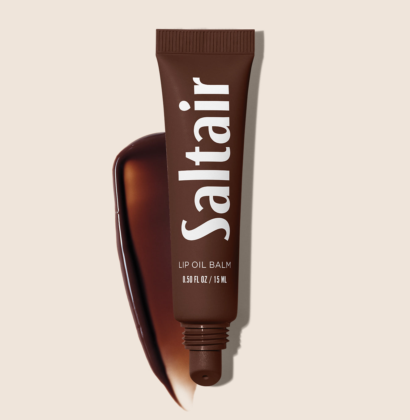 2-SLTR_PDP_LipOilBalm_Overhead-Swatch_Cacao_3000x.jpg